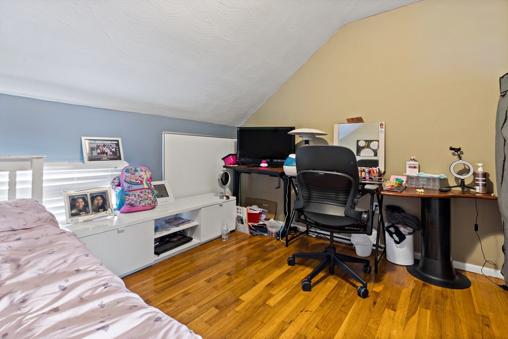 163 Warren Street Fall River, MA 02721 - Photo 33 of 39 a view of a workspace with furniture and bedroom