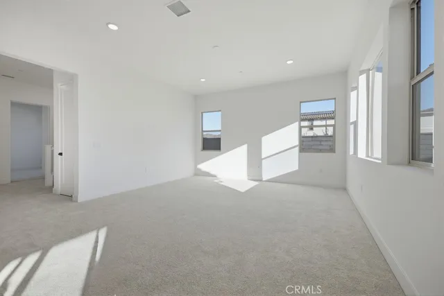 a kitchen with a sink appliances and cabinets