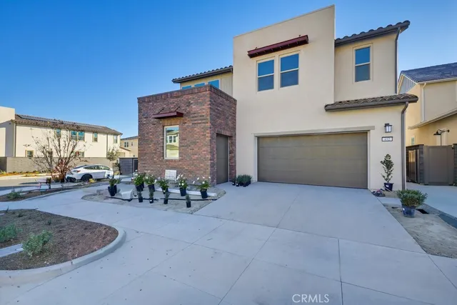 a view of a chairs and table in the house