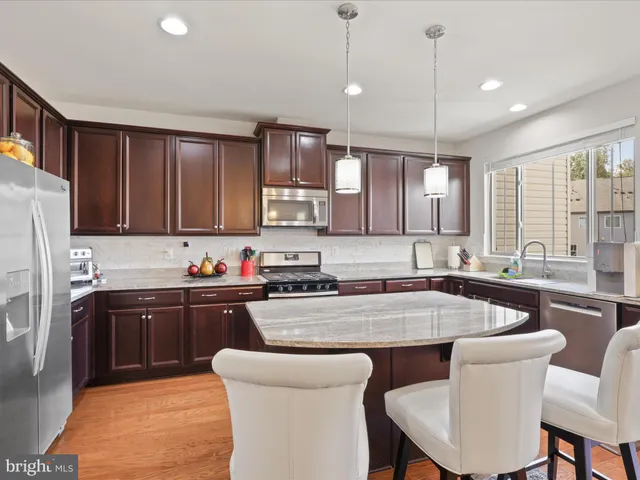 a kitchen with granite countertop a sink and counter space