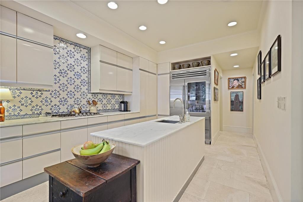 10 Palisades Road Northeast Atlanta, GA 30309 - Photo 13 of 49 a kitchen with a sink appliances and cabinets