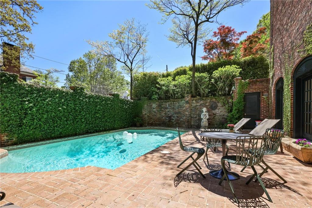 10 Palisades Road Northeast Atlanta, GA 30309 - Photo 42 of 49 a view of backyard with seating and green space