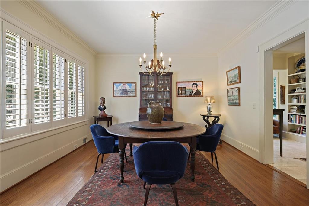 10 Palisades Road Northeast Atlanta, GA 30309 - Photo 8 of 49 a view of a dining room with furniture window and wooden floor
