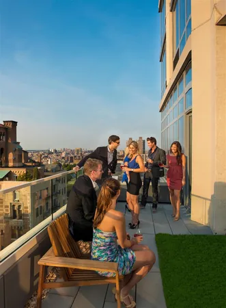 a view of a chairs and table in a balcony