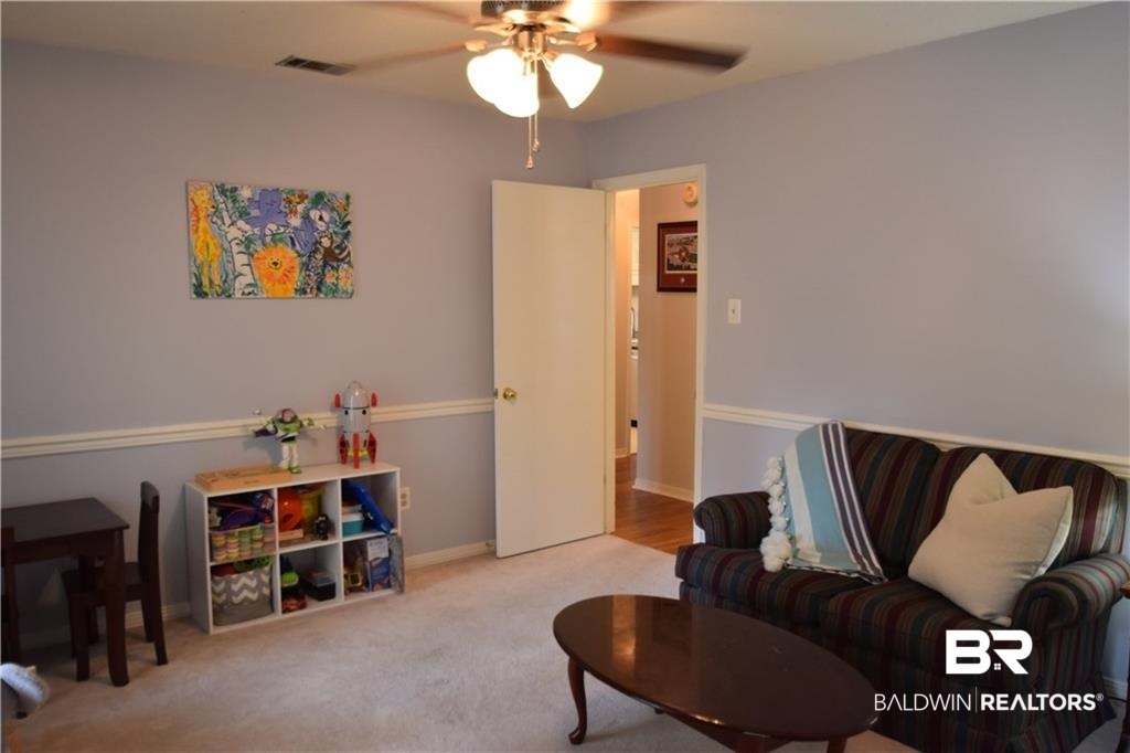 852 West Briar Court Mobile, AL 36609 - Photo 8 of 40 The third bedroom doubles as play room and office.