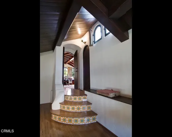 a view of lobby with mirror