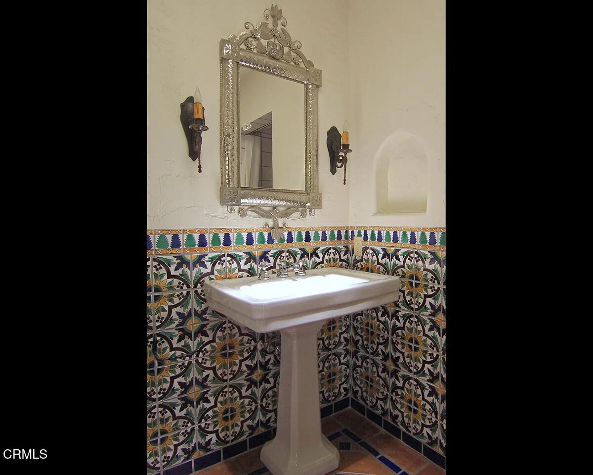 5237 Alta Canyada Road La Canada Flintridge, CA 91011 - Photo 17 of 27 a bathroom with a sink and a mirror