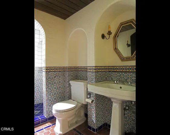 a bathroom with a sink and a toilet