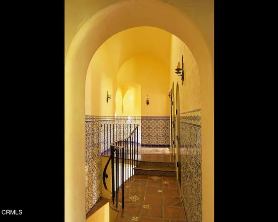 a view of a balcony with staircase