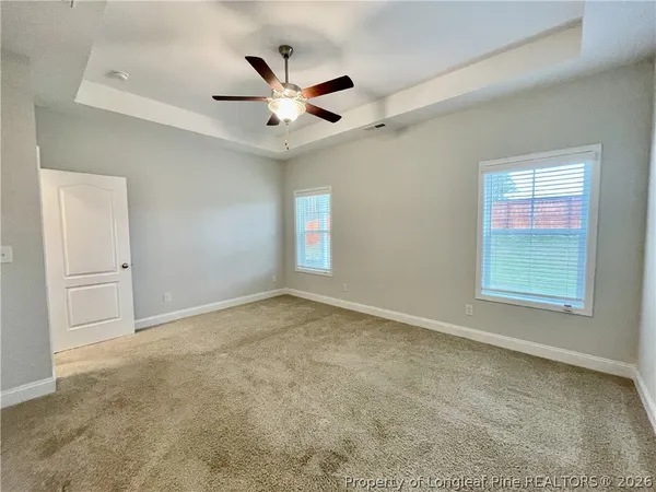 en empty room with windows
