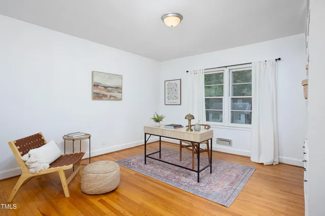 a view of a bathroom with a potted plant