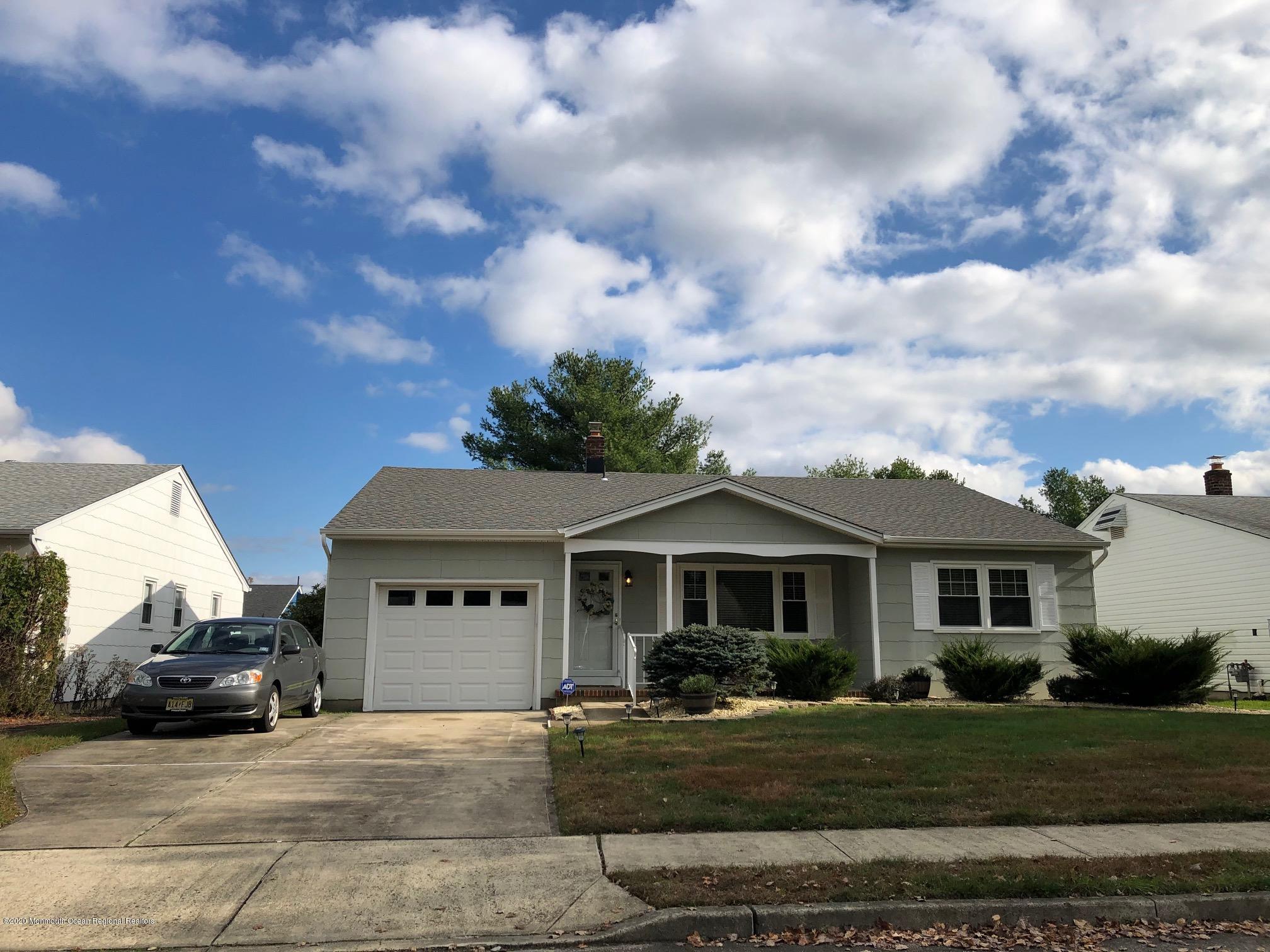 34 Oakfield Road Toms River, NJ 08757 - Photo 1 of 8 OAKFIELD FRONT W OVERSIZED DRIVEWAY