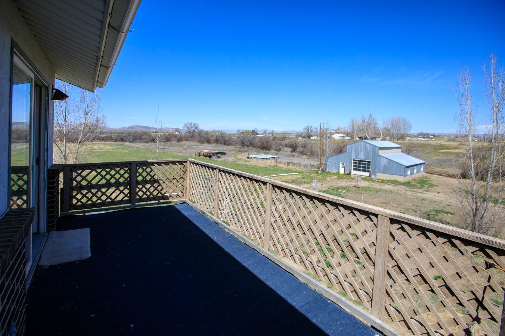 1179 17 Road Fruita, CO 81521 - Photo 16 of 36 a view of balcony with outdoor space