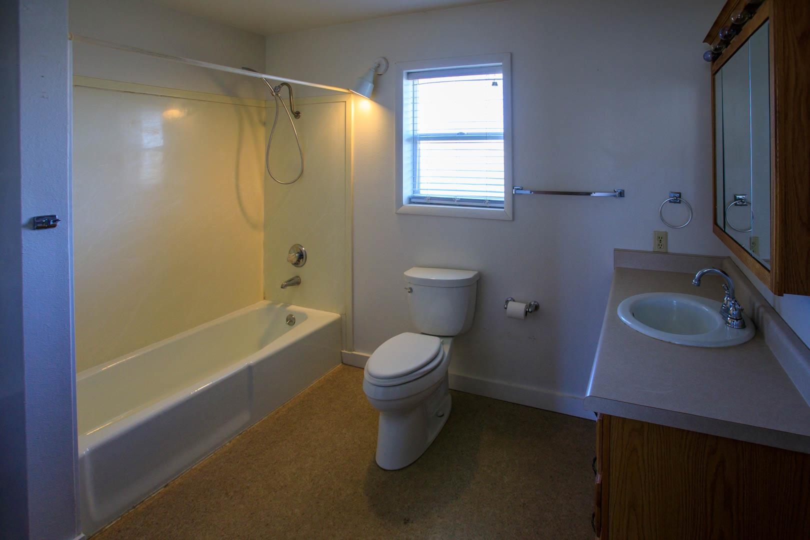 1179 17 Road Fruita, CO 81521 - Photo 19 of 36 a bathroom with a sink a toilet and shower