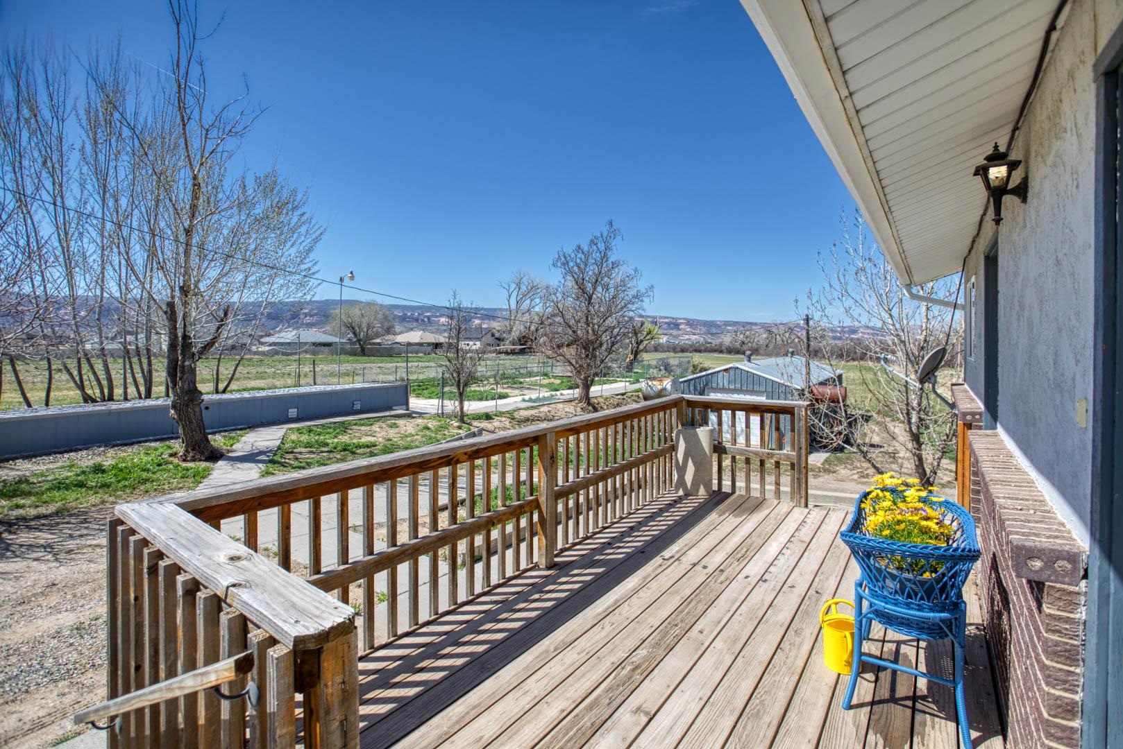 1179 17 Road Fruita, CO 81521 - Photo 29 of 36 a view of balcony with wooden floor and outdoor seating