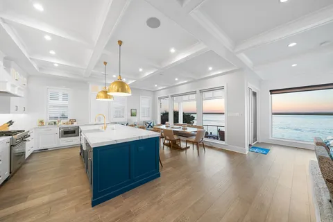 a view of a kitchen and dining room