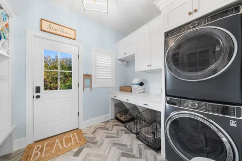 a view of a kitchen with washer and dryer
