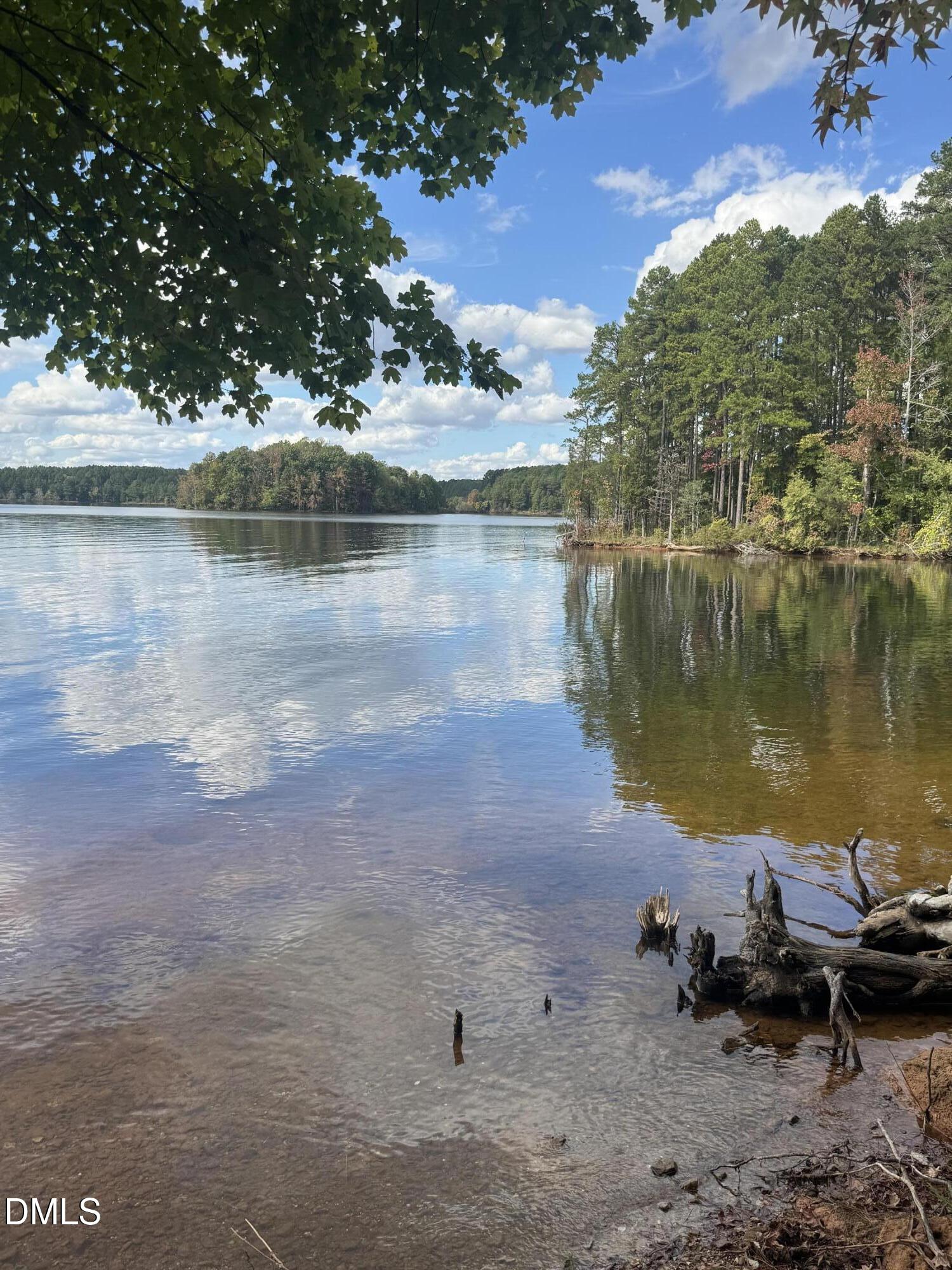 0 New Mayo Drive Roxboro, NC 27574 - Photo 24 of 27 a view of a lake with houses