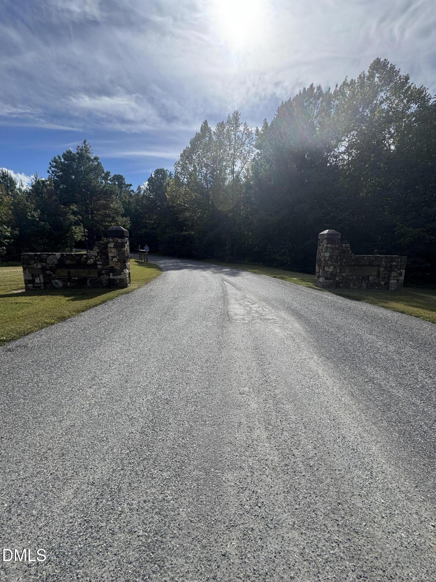 0 New Mayo Drive Roxboro, NC 27574 - Photo 4 of 27 a view of a golf course with an ocean