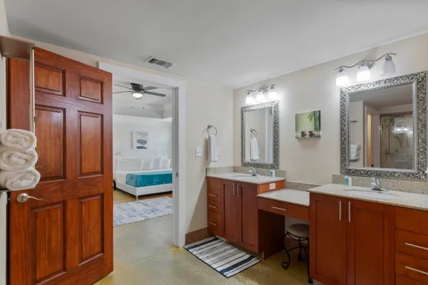 a bathroom with a bathtub and a sink