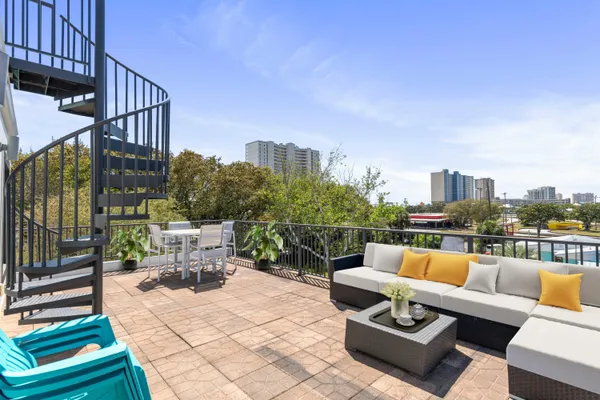 a view of a terrace with couches