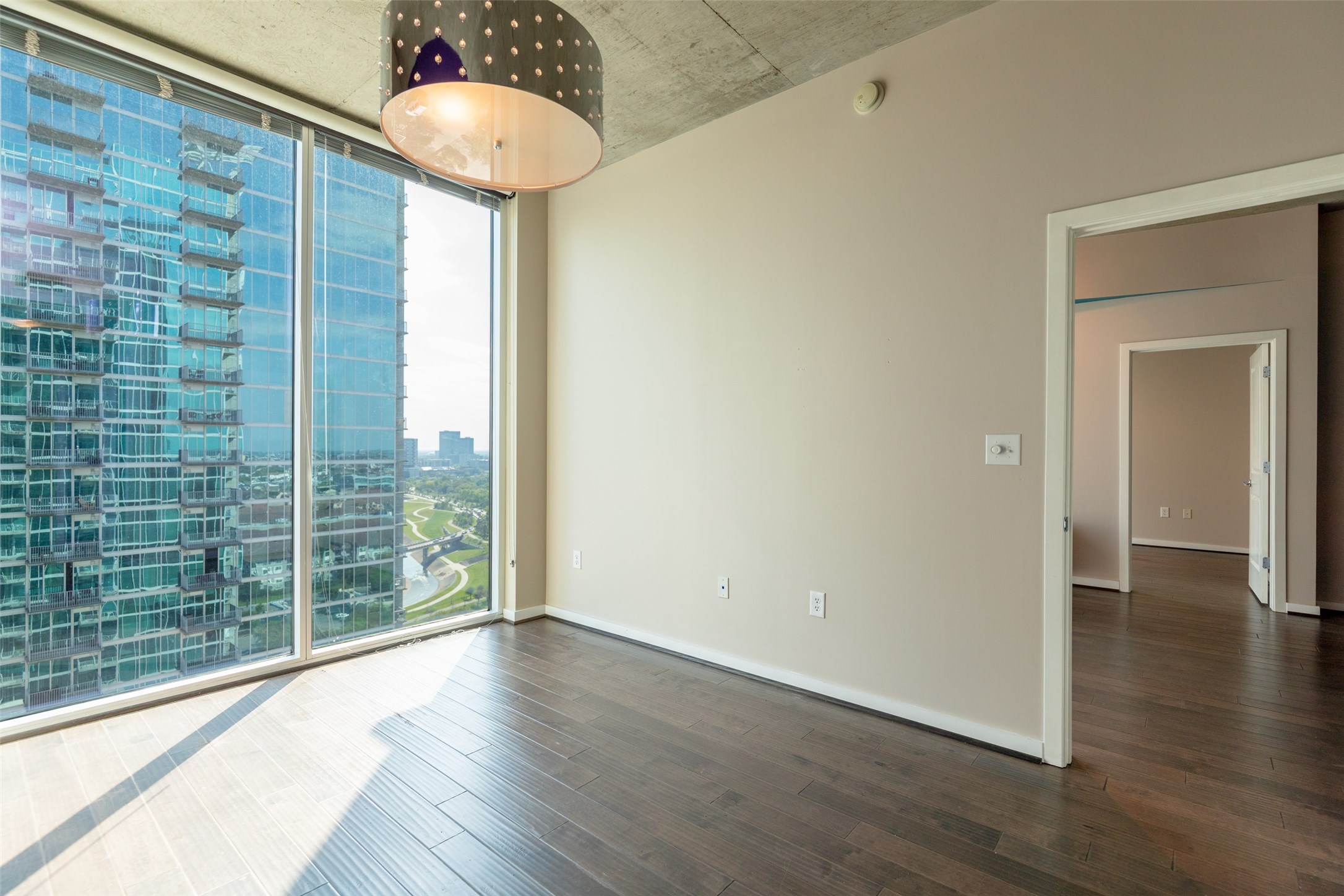 5925 Almeda Road, Unit 11814 Houston, TX 77004 - Photo 17 of 41 Beautiful spacious Master bedroom with huge 10' windows overlooking the medical center