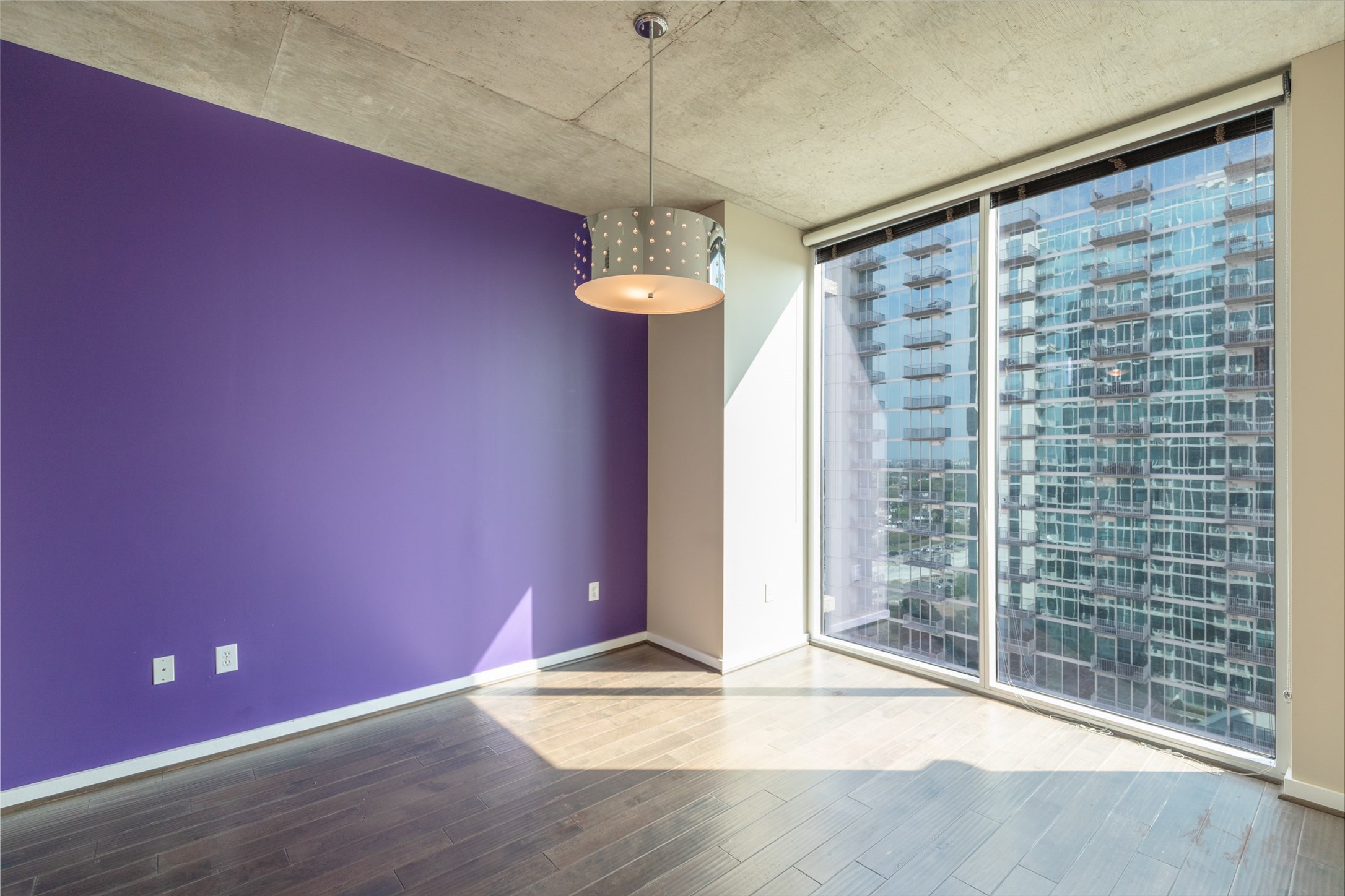 5925 Almeda Road, Unit 11814 Houston, TX 77004 - Photo 18 of 41 Master bedroom with accent walls and lots of natural light!