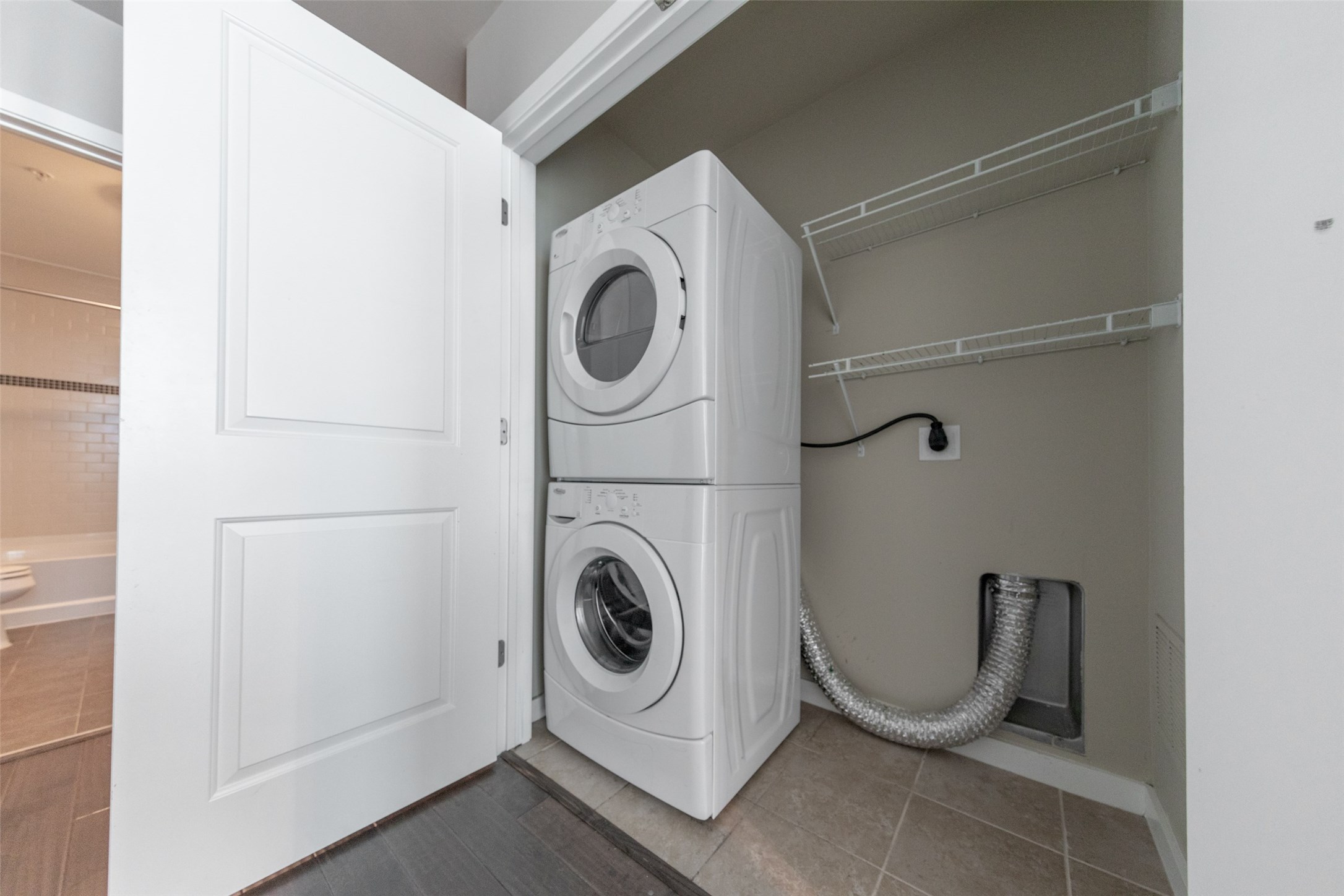 5925 Almeda Road, Unit 11814 Houston, TX 77004 - Photo 30 of 41 Spacious utility area with included washer and dryer