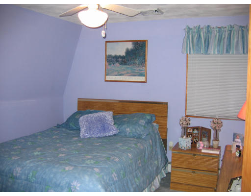 32 Moran Road Billerica, MA 01862 - Photo 15 of 18 a bedroom with a bed and dresser