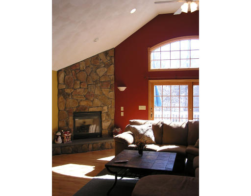 32 Moran Road Billerica, MA 01862 - Photo 2 of 18 a living room with furniture and a fireplace