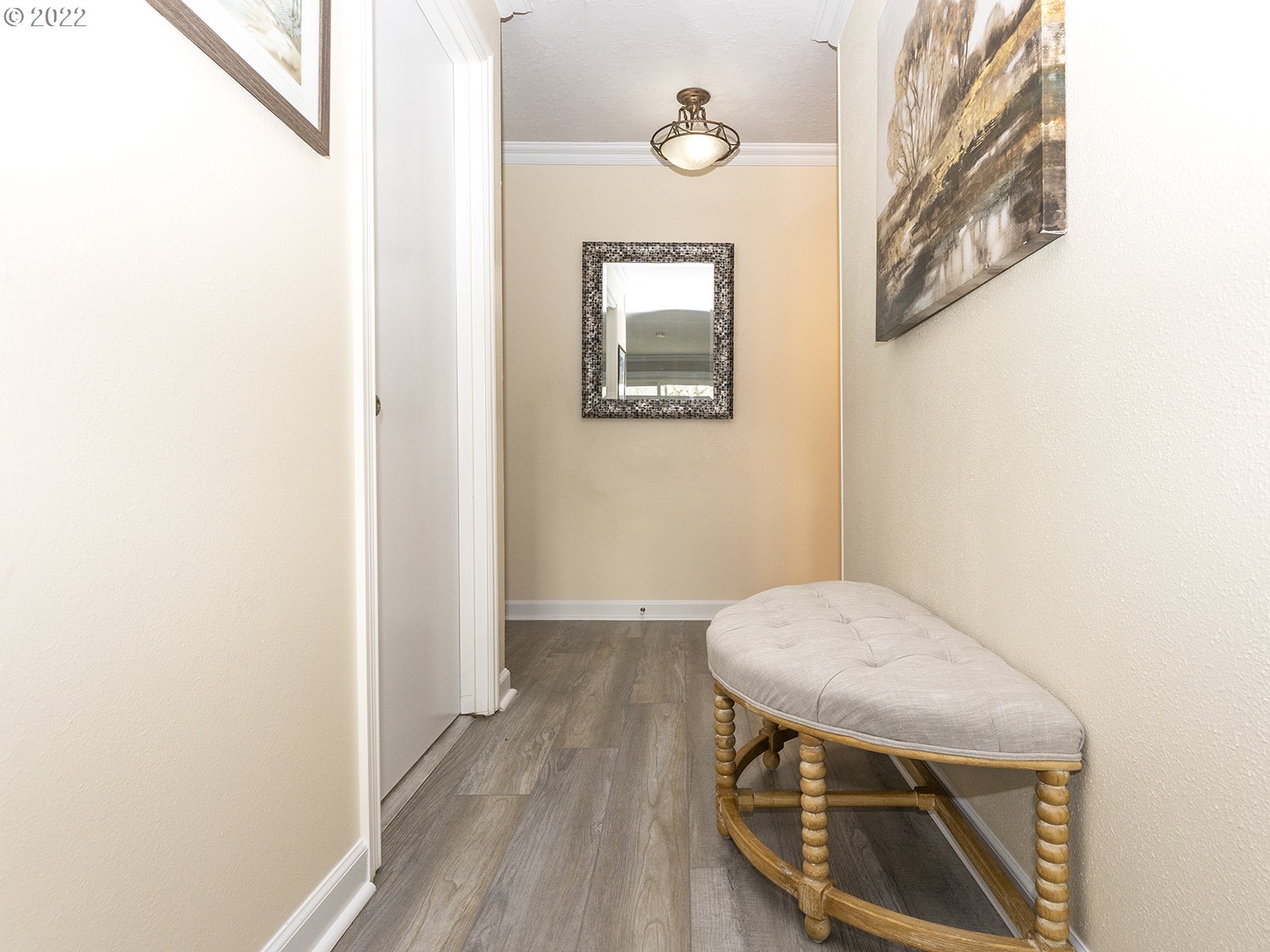 9784 Southwest Tualatin Road Tualatin, OR 97062 - Photo 4 of 32 a view of a hallway with wooden floor