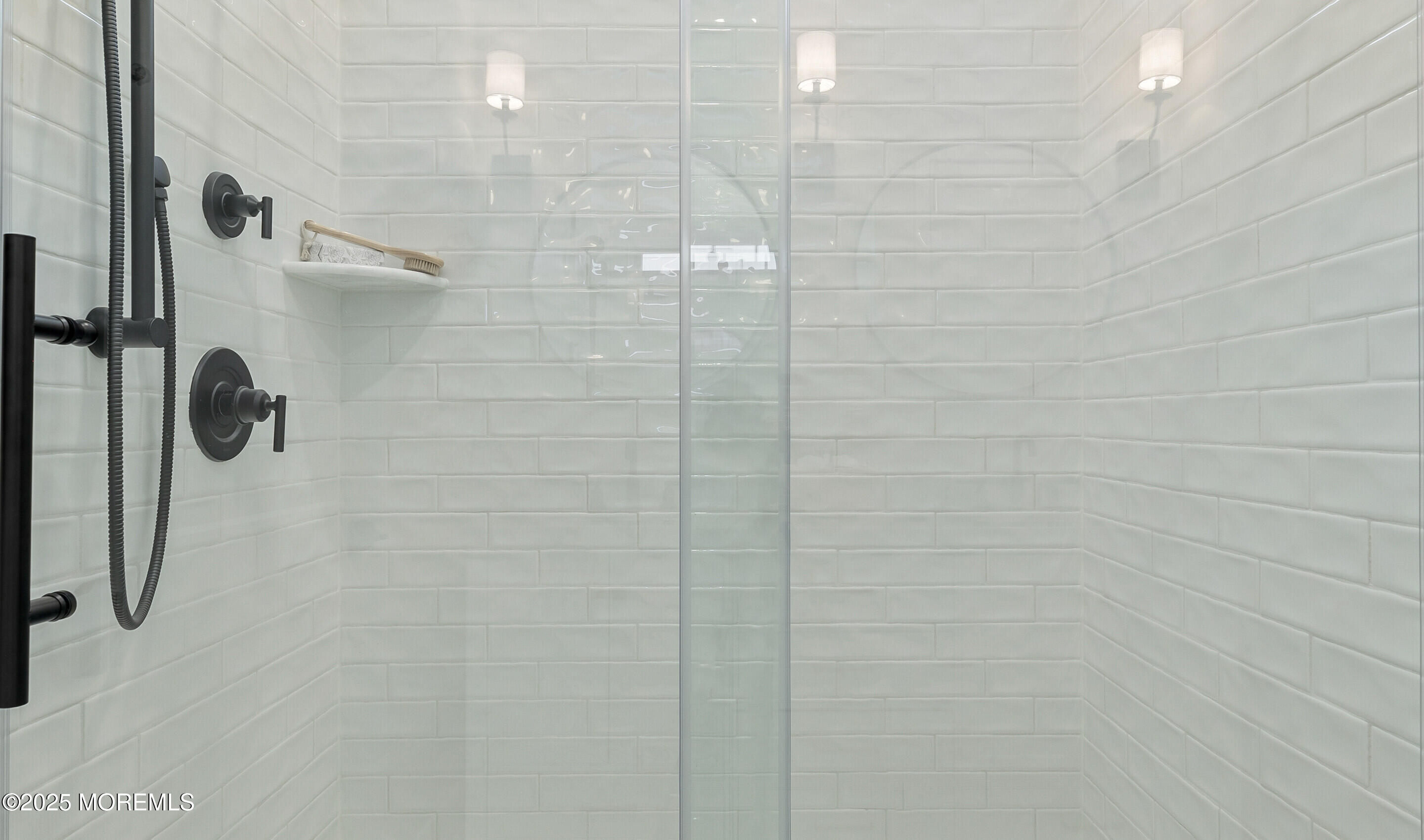 176 Highway 33, Unit DORCHESTER LOFT Manalapan, NJ 07726 - Photo 24 of 38 a bathroom with a shower