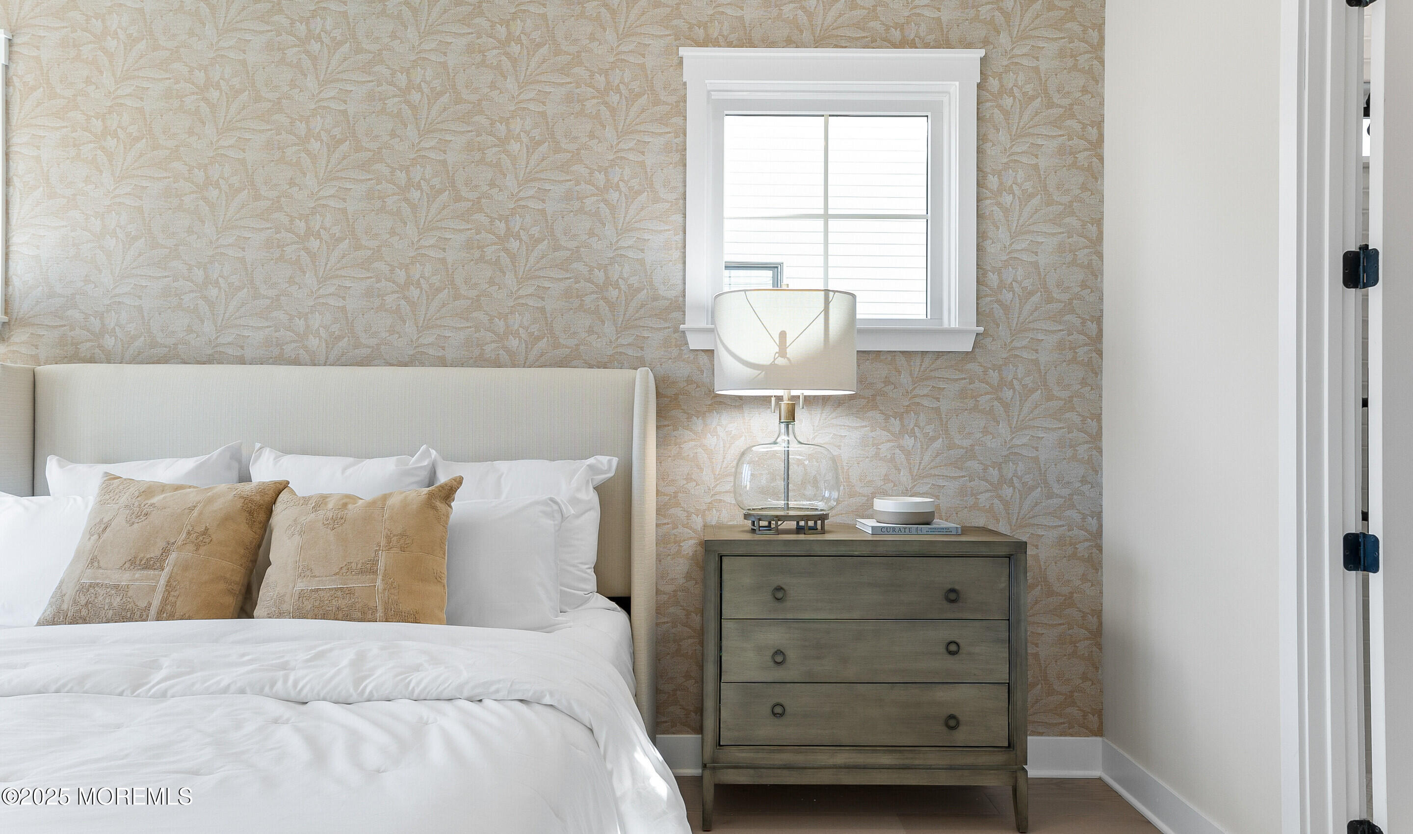 176 Highway 33, Unit DORCHESTER LOFT Manalapan, NJ 07726 - Photo 30 of 38 a bed room with a bed and a night stand