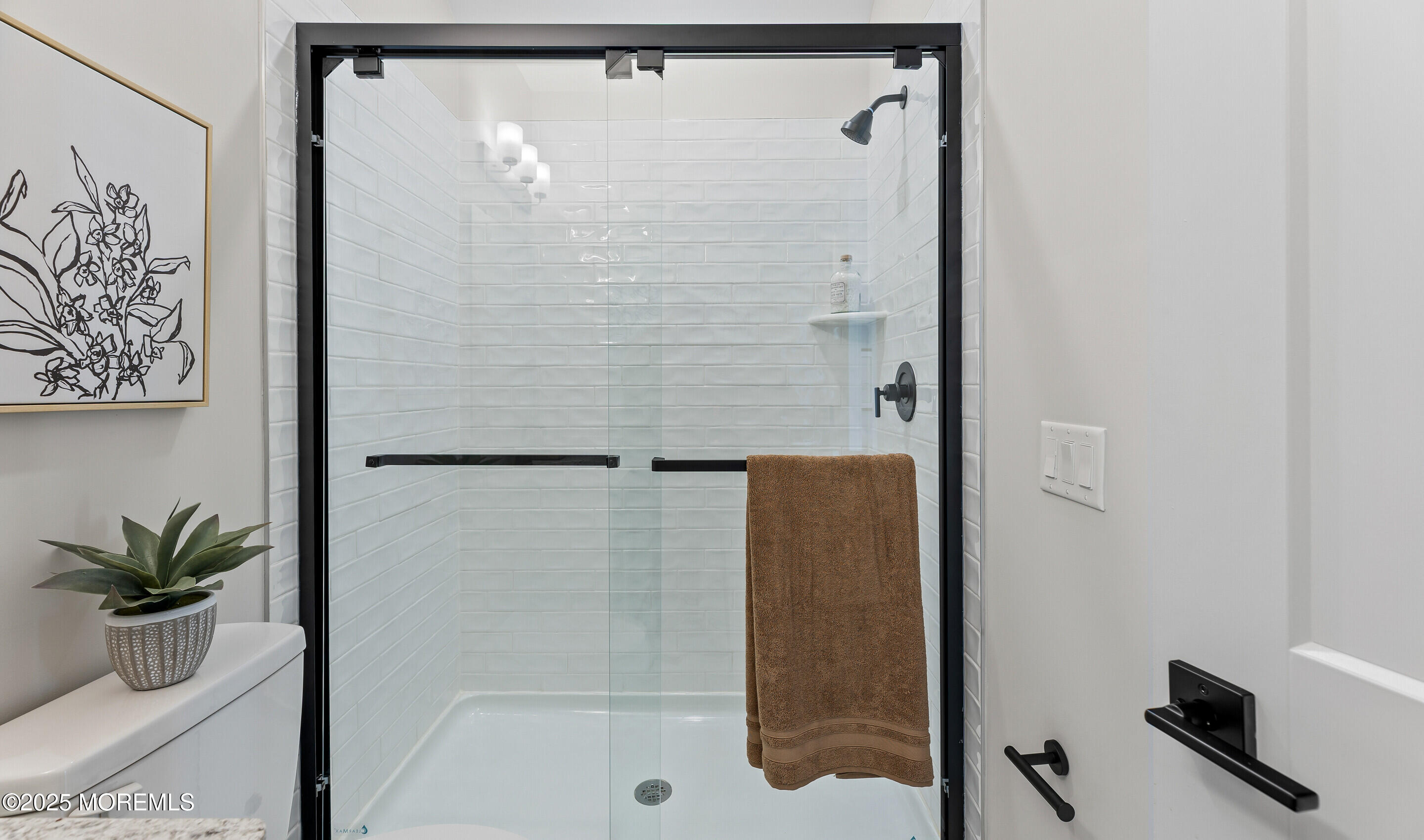 176 Highway 33, Unit DORCHESTER LOFT Manalapan, NJ 07726 - Photo 34 of 38 a bathroom with a shower