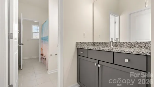 a view of a granite countertop cabinets