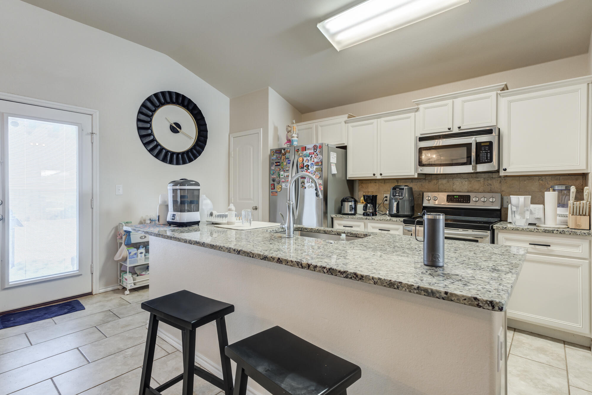7012 34th Place Lubbock, TX 79407 - Photo 14 of 28 7012-34th-Pl_22_Kitchen
