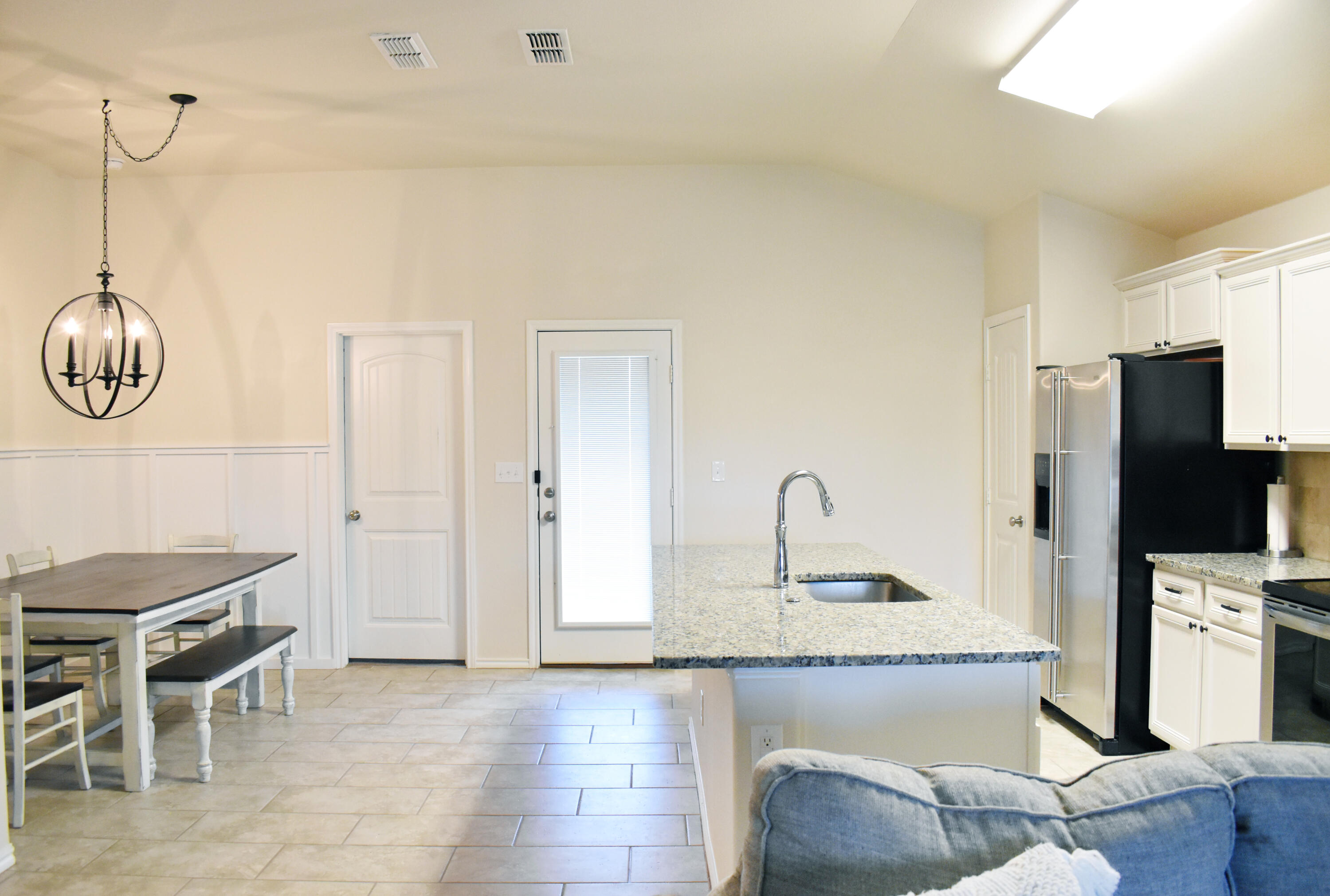 7012 34th Place Lubbock, TX 79407 - Photo 3 of 28 7012-34th-Pl_33_DiningRoom