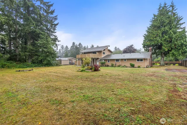a bathroom with a sink and a yard
