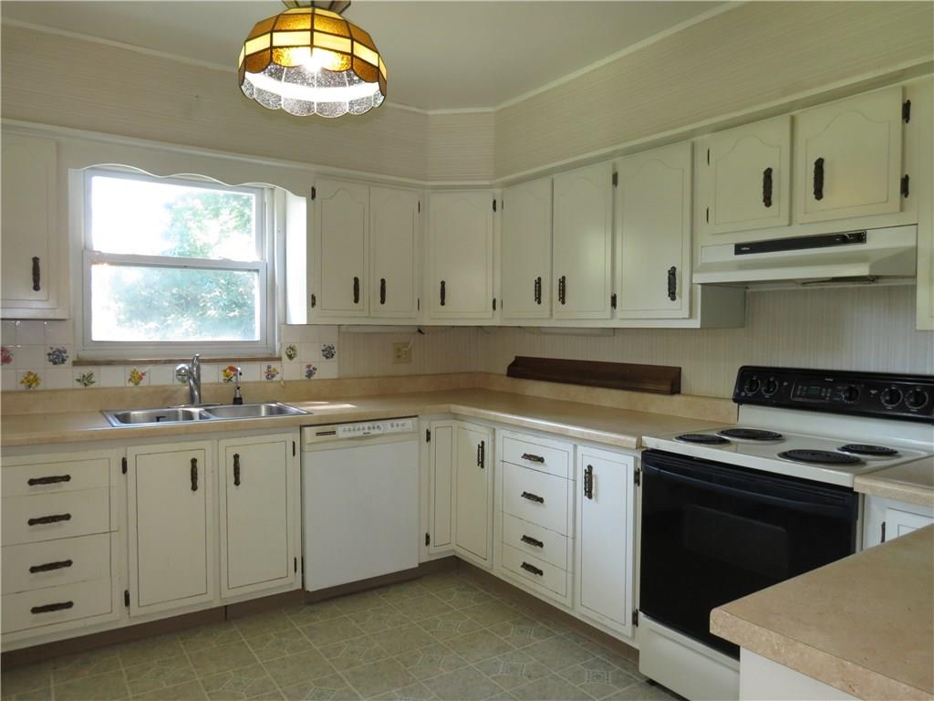 1322 Powers Run Road Pittsburgh, PA 15238 - Photo 4 of 21 Plenty of cabinet space in this cheery kitchen!