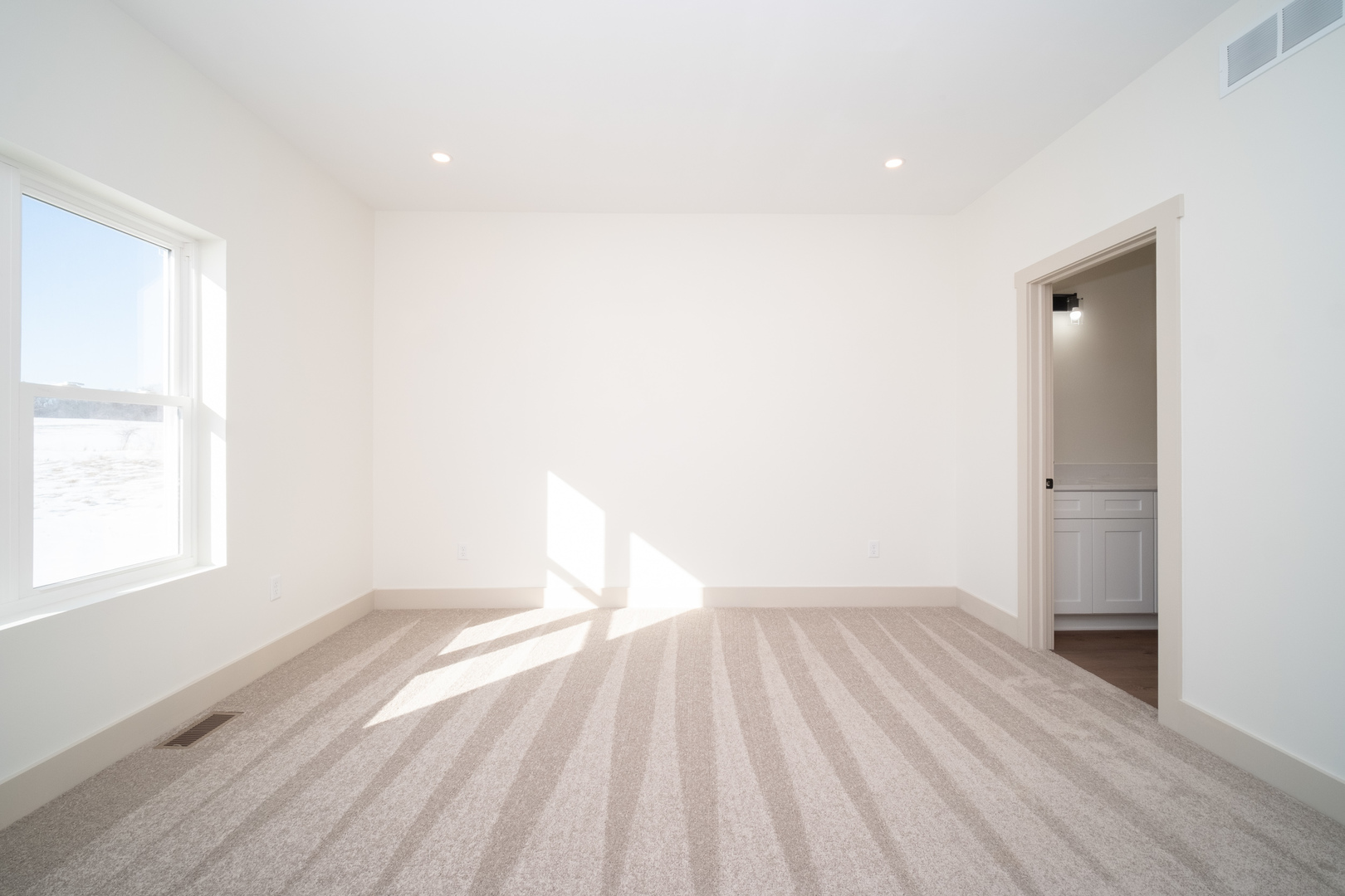 550 Cross Plains Road Rockford, IL 61107 - Photo 17 of 34 a view of empty room with wooden floor and fan