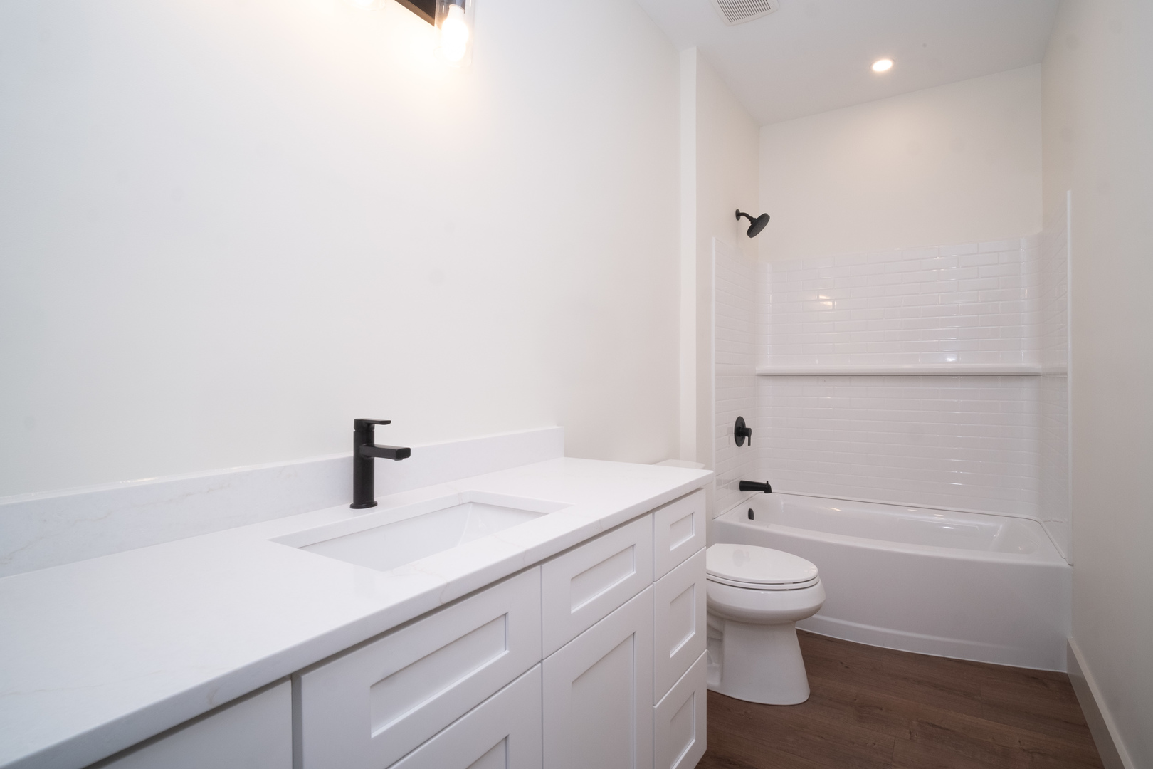 550 Cross Plains Road Rockford, IL 61107 - Photo 27 of 34 a bathroom with a sink a toilet and a shower