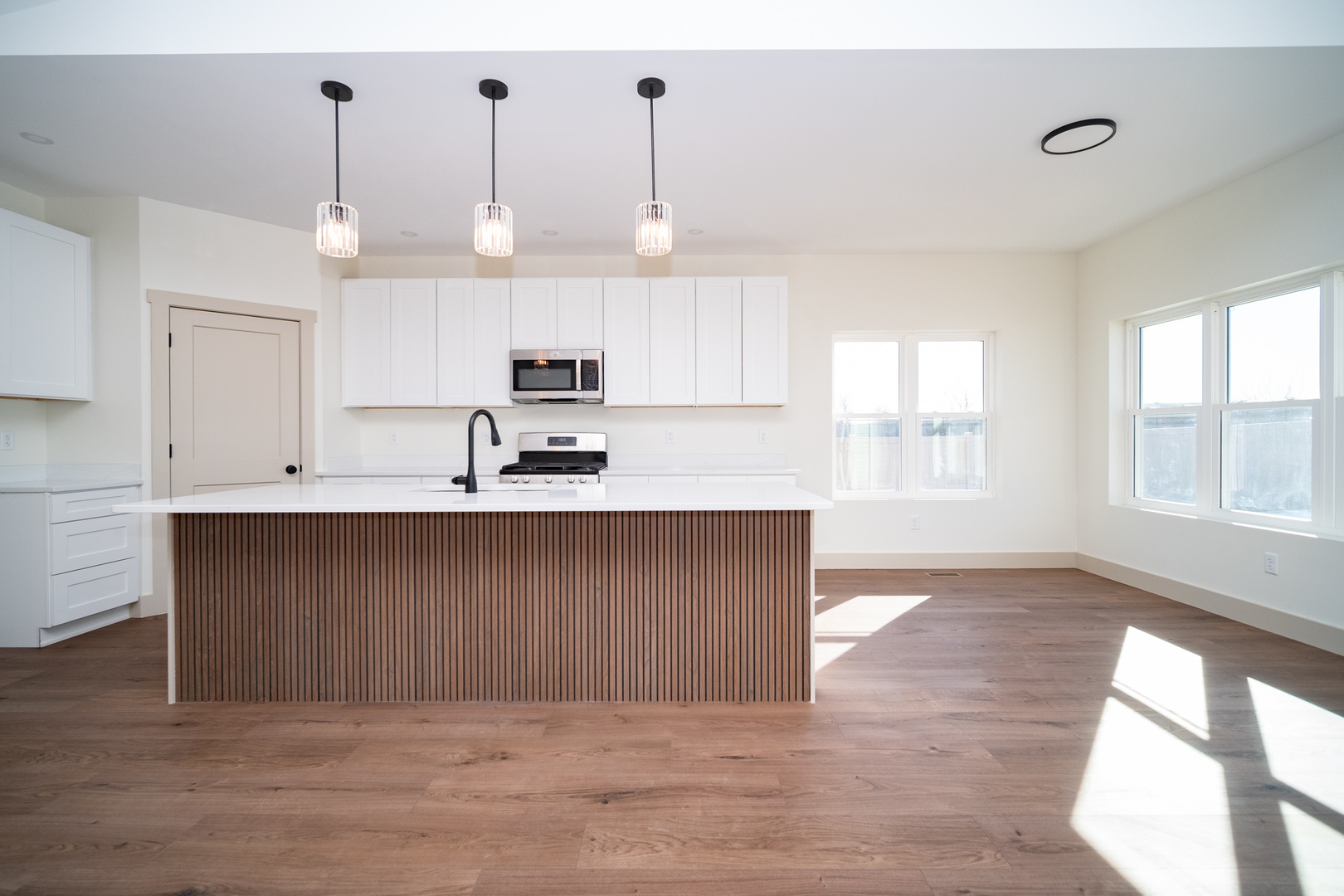 550 Cross Plains Road Rockford, IL 61107 - Photo 8 of 34 a kitchen with kitchen island a sink stainless steel appliances and cabinets