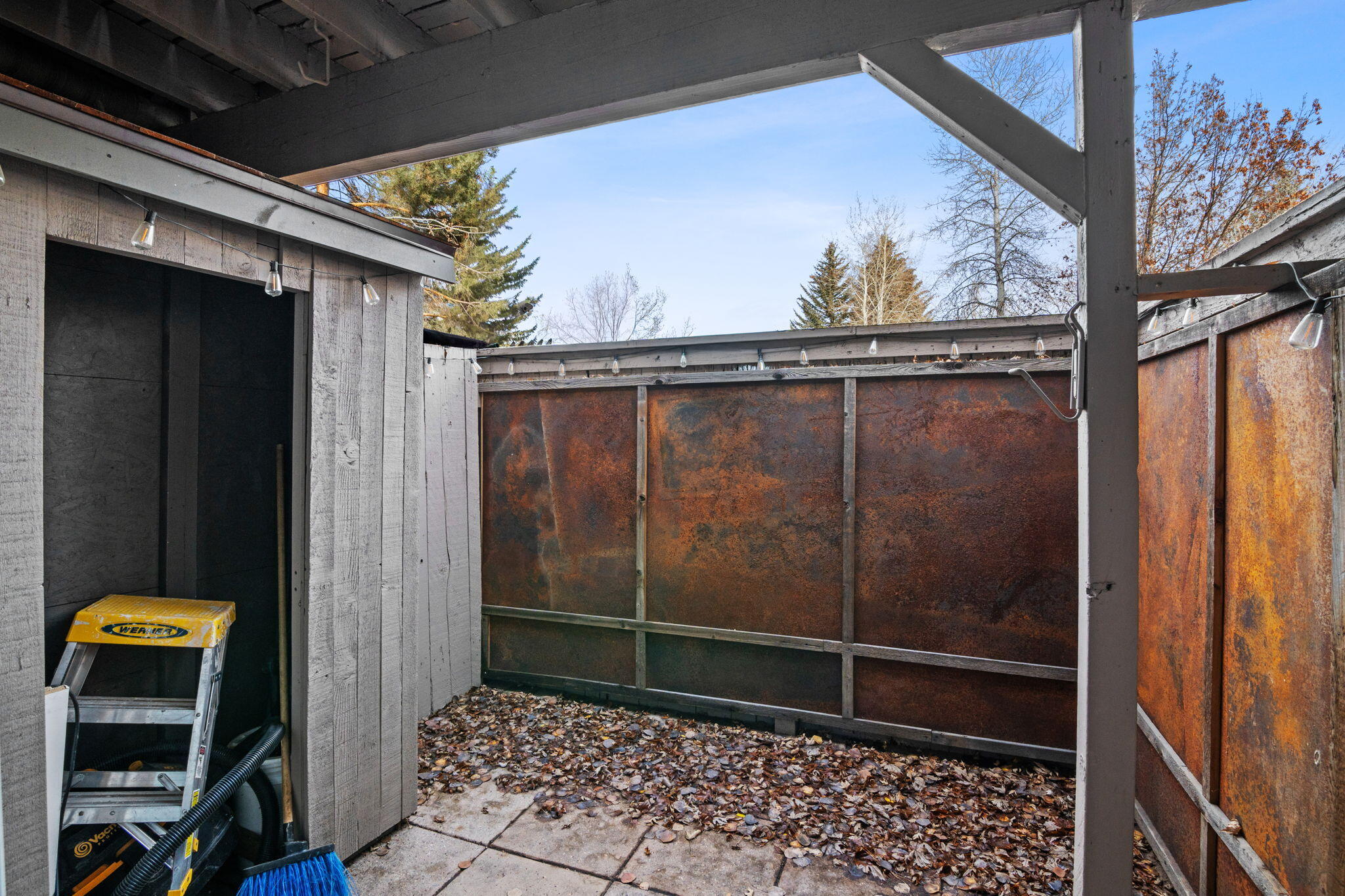 235 Pinewood Lane, Unit A11 Ketchum, ID 83340 - Photo 12 of 19 lower level patio & storage shed
