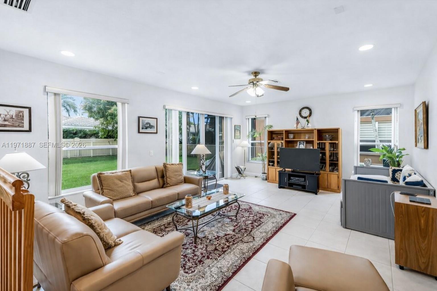 5321 Southwest 184th Way Miramar, FL 33029 - Photo 14 of 43 a living room with furniture fireplace and a large window