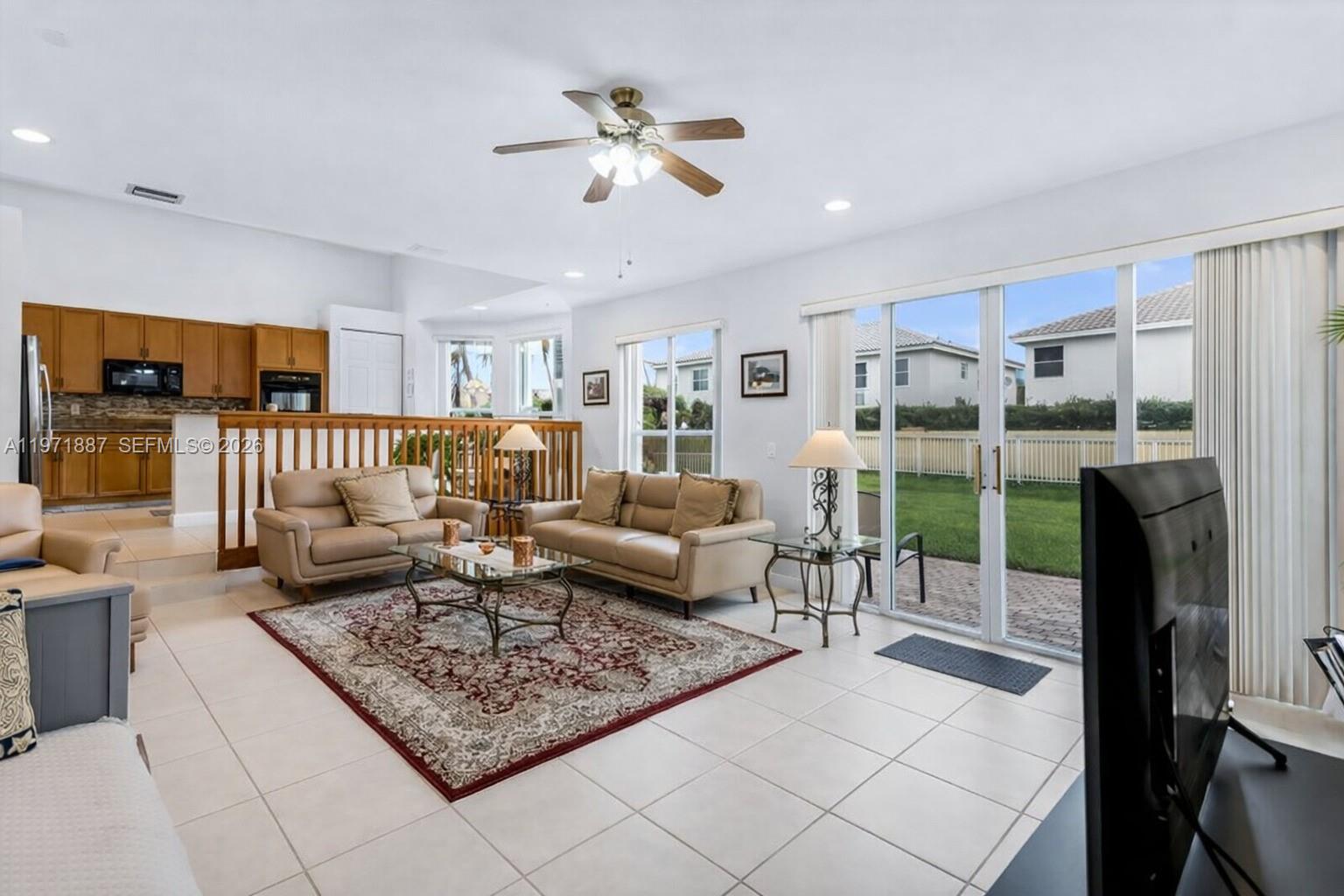 5321 Southwest 184th Way Miramar, FL 33029 - Photo 15 of 43 a living room with furniture and a rug