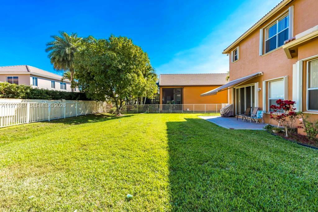 5321 Southwest 184th Way Miramar, FL 33029 - Photo 32 of 43 a view of a house with a swimming pool
