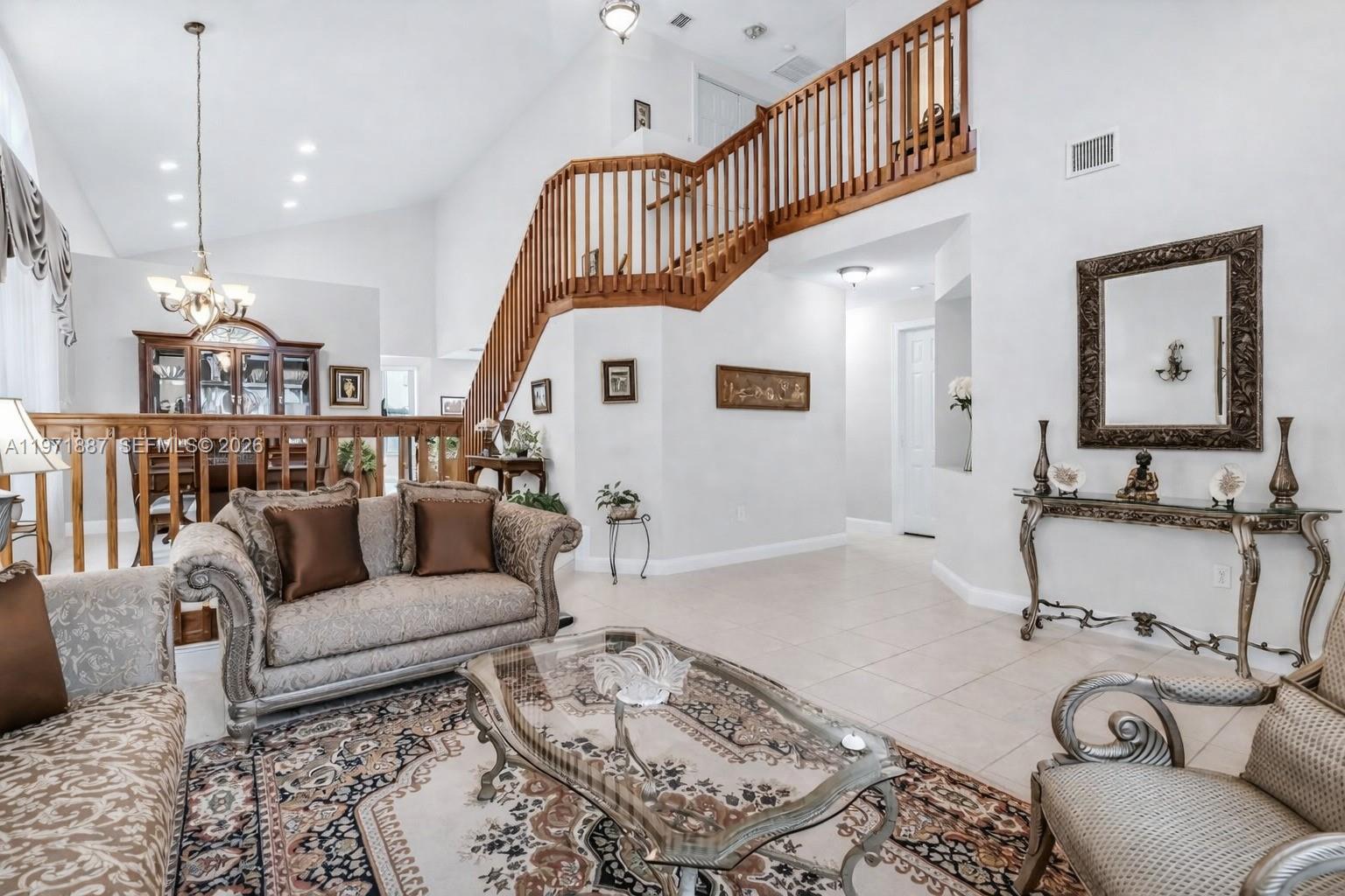 5321 Southwest 184th Way Miramar, FL 33029 - Photo 7 of 43 a living room with furniture and a rug