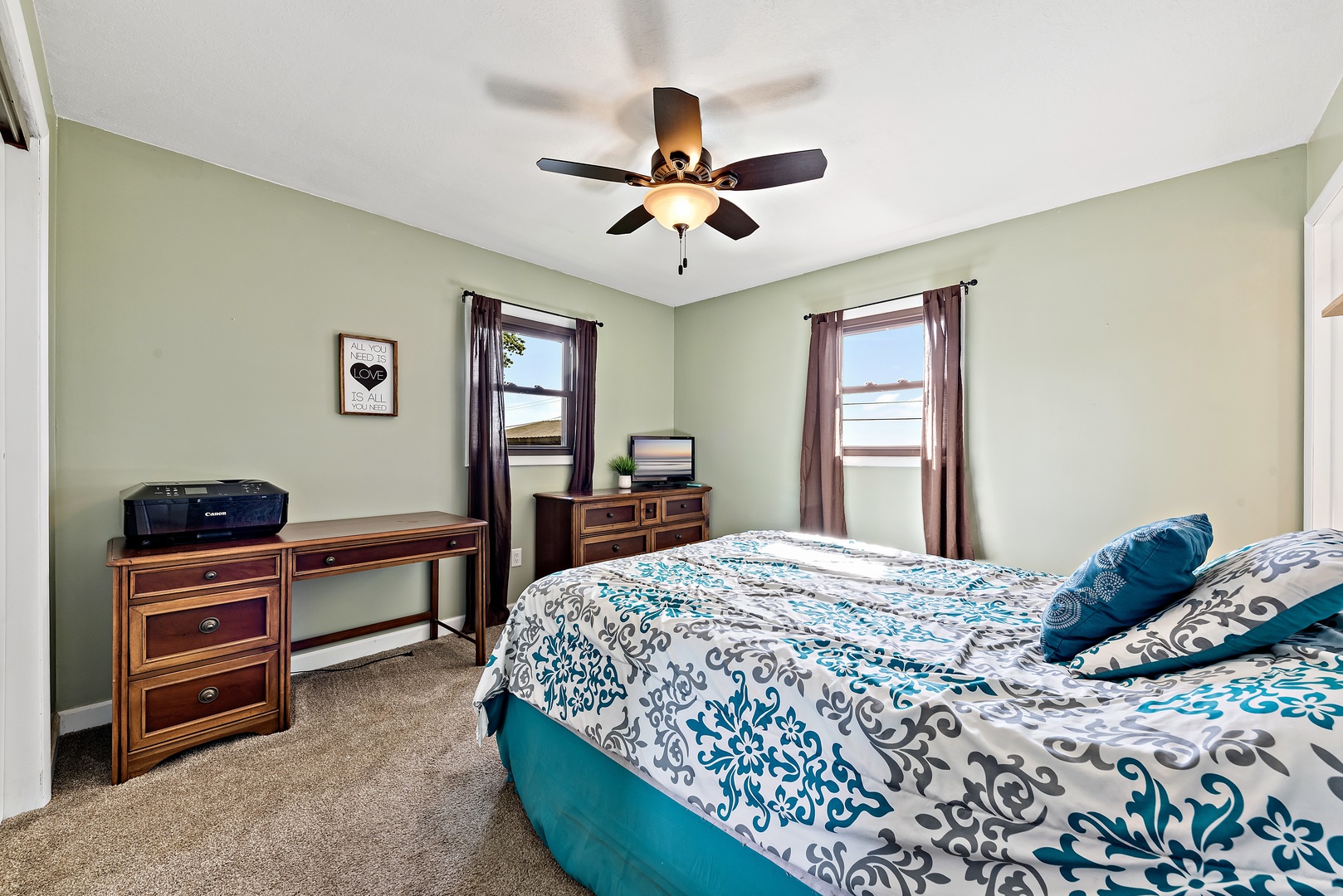 3248 River Road Kankakee, IL 60901 - Photo 11 of 32 a bedroom with a bed and a dresser in it