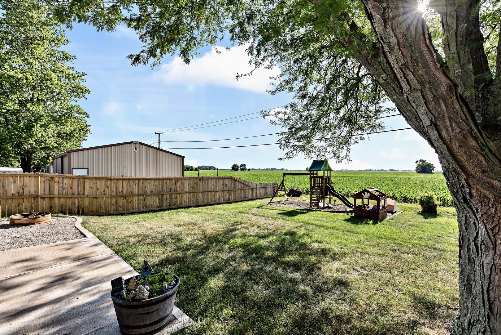 3248 River Road Kankakee, IL 60901 - Photo 16 of 32 a view of a backyard with sitting area
