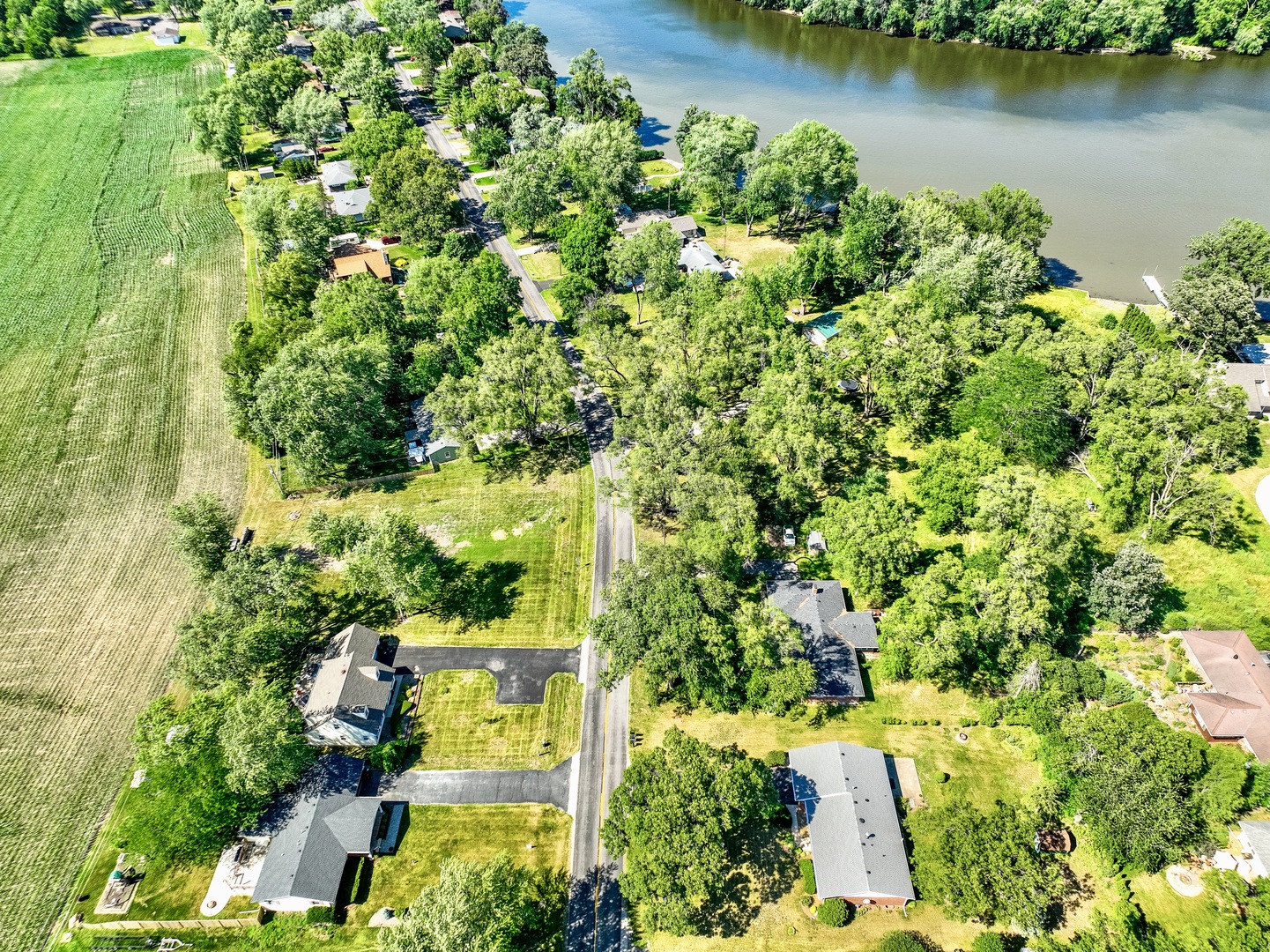 3248 River Road Kankakee, IL 60901 - Photo 19 of 32 an aerial view of a house with a yard and lake view